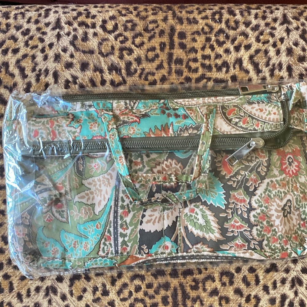 COPY - Cool multi compartment organizer bag! Pretty colors and patterns . Great…